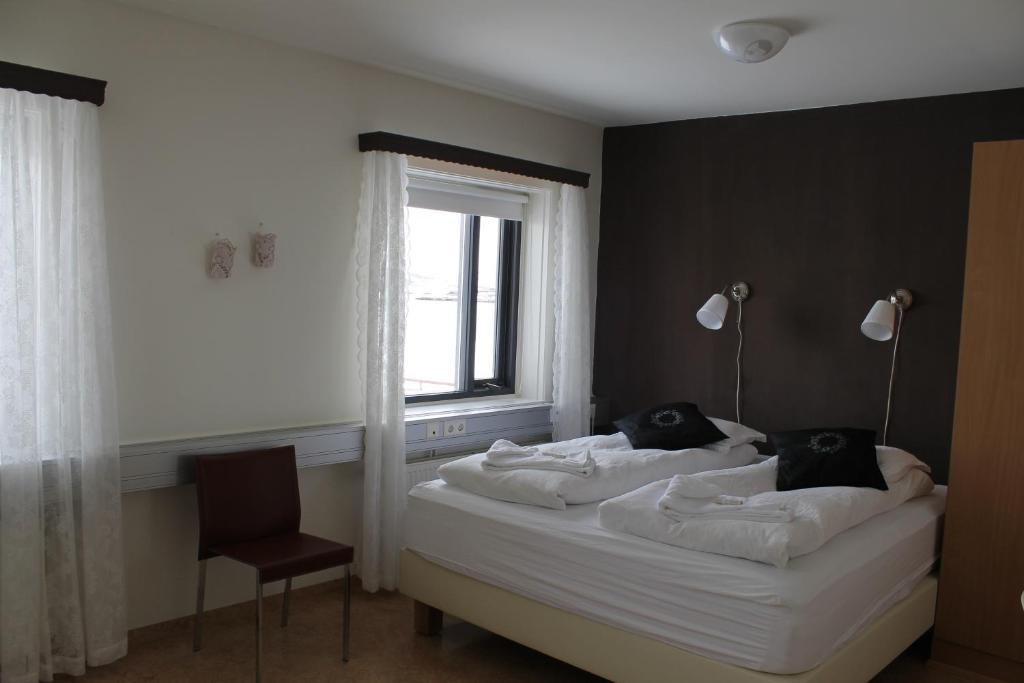 Skjaldarvik Guesthouse Акурейрі Номер фото